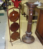 A three-tier mahogany cake stand and an early-19th century rosewood torchère, (2).