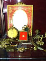 A Continental gilt metal picture frame in the French taste, 24 x 33cm, (strut lacking), a silver and