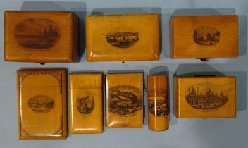 A collection of eight pieces of Mauchline ware, comprising: four boxes, two card cases, a