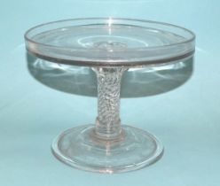 A late-18th/early-19th century glass tazza with circular galleried top, on twist stem and conical