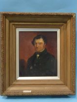 19th century English School PORTRAIT OF A GENTLEMAN WEARING A GREEN COAT Oil on board, 23 x 20cm.