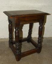 An antique oak joint stool, 45 x 26cm, 55cm high.