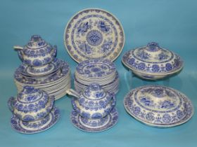 A collection of late-19th century Spode blue and white dinner ware decorated with vases and flowers,