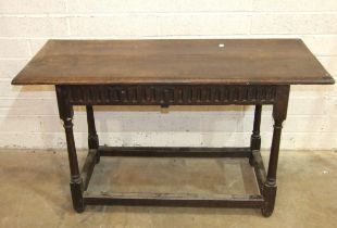 An antique rectangular centre table, the top with moulded edge, on turned legs and stretchers, 120cm