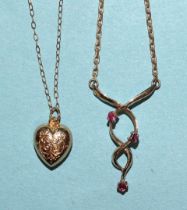 A 9ct gold necklet set red stones and a 9ct gold chain, total weight 4g and an unmarked heart
