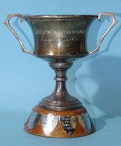 A silver two-handled trophy cup, 12.5cm high, Birmingham 1963, ___5.6oz, engraved with winners'