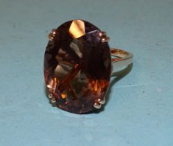 A large 14ct gold dress ring set smoky quartz, 24 x 18mm, size P½, 10.5g.