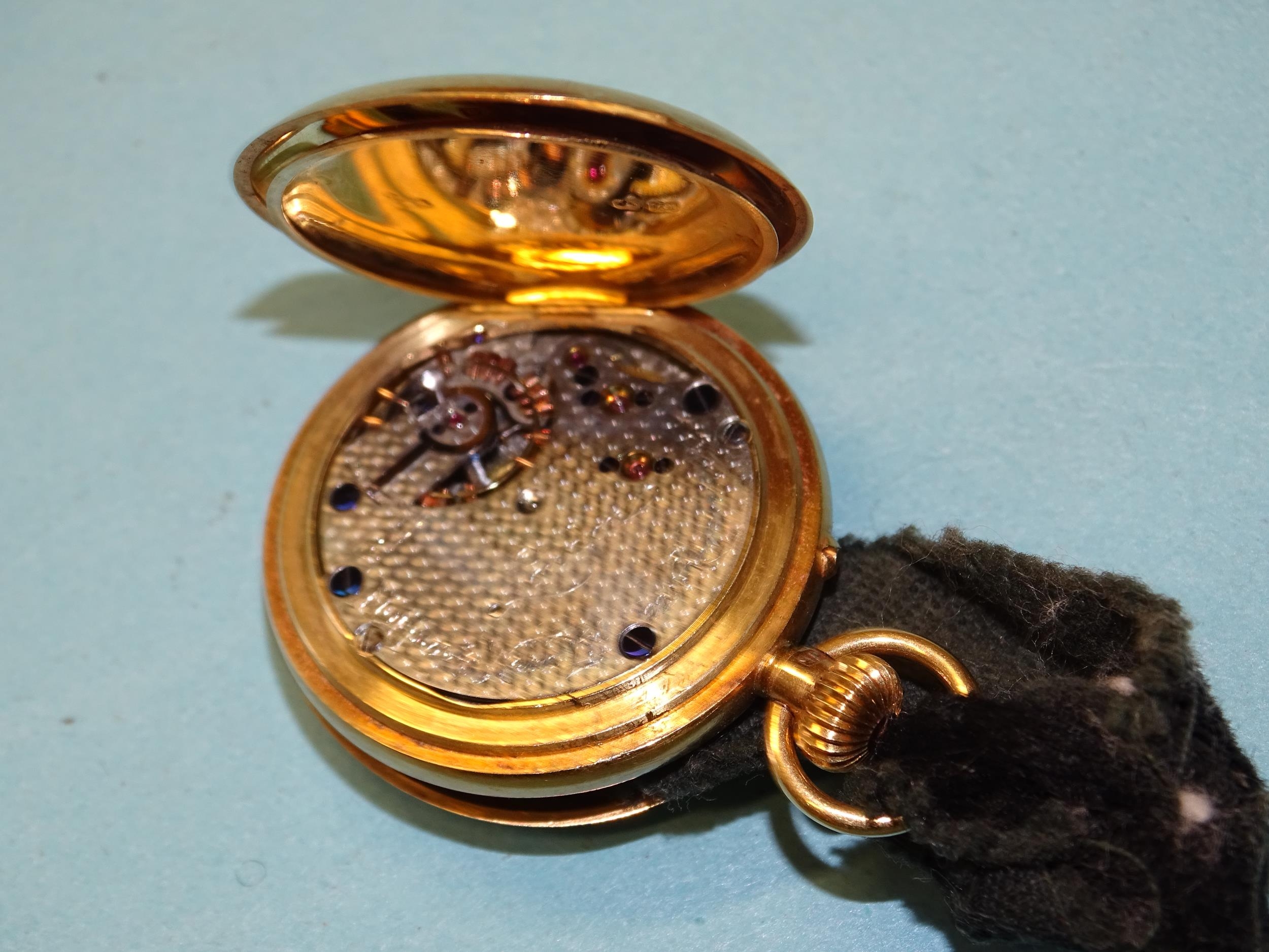 Mappin & Webb, a lady's 18ct gold half-hunter-cased keyless pocket watch, the signed white enamel - Image 4 of 4