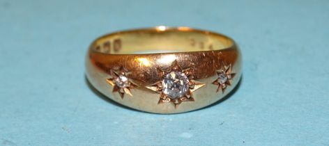 A Victorian 18ct gold gipsy ring set three diamonds, size O½, 5.6g.