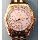 A Breitling 18ct gold Automatic Chronomat wrist watch, the white dial with baton numerals, three