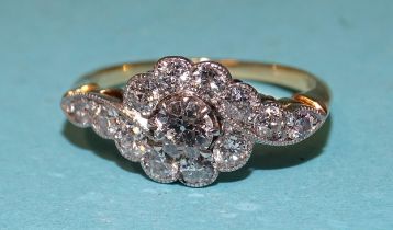 An Edwardian diamond cluster ring, the central old brilliant-cut diamond of approximately 0.3cts