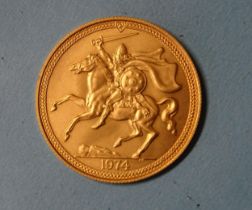 An Elizabeth II Isle of Man 1974 £2 gold coin, approximately 15.9g.