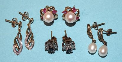 A pair of 14k gold ear studs set cultured pearls and marquise-cut rubies, 2.8g and three other pairs