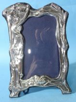 A modern silver photo frame in the Art Nouveau style, 22 x 16cm, London 1990, maker David Richards &