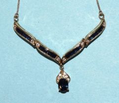 A 14ct gold necklet set blue sapphires and white synthetic stones, 5.1g.