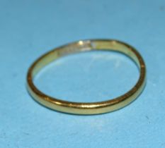 A 22ct gold wedding ring, size L, 1.3g.