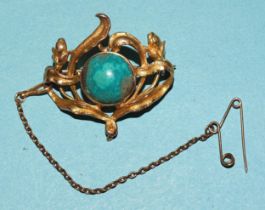 A gold brooch of sinuous floral design set turquoise matrix, marked ‘14k’, 5.4g.