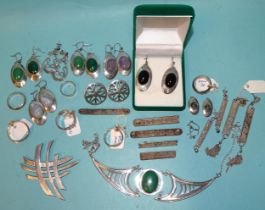 A silver necklace of Celtic design set malachite by Gordon H Walker, a pair of matching earrings,