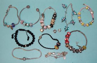 Ten modern charm bracelets marked Pandora, Rhona Sutton, Charm Company, etc.