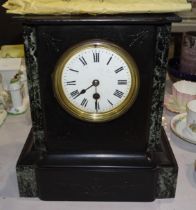 A black slate and marble-cased mantel clock, 28cm high, 25cm wide.