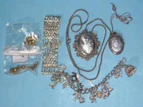 Two silver lockets on chains, a silver gate-link bracelet, a silver charm bracelet, total weight