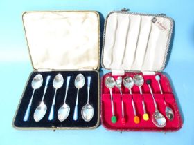 A set of six silver coffee spoons with blue plastic finial, Sheffield 1929 and a set of EPNS