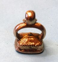 An early-19th century gold overlay fob seal with uncarved smoky quartz intaglio, 25mm high, 7.3g.