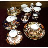 A modern Royal Crown Derby Imari pattern plate, a miniature vase and other Royal Crown Derby pieces.