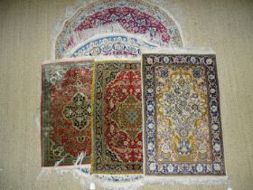 Two modern circular Oriental rugs, 130cm diameter and 120cm diameter and three other small