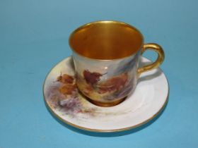 A Royal Worcester cabinet cup and saucer decorated with Highland cattle in a landscape, signed H.