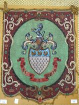 An unframed beaded coat of arms, 59 x 45cm.