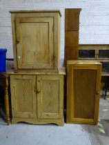 A two-door pine cupboard, 80cm high, 80cm wide and two other pine cupboards, (3).