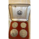 CASED MONTREAL OLYMPIC COINS