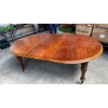 MAHOGANY EXTENDING DINING TABLE & LEAF-WINDER IN OFFICE