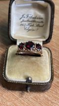 9CT GOLD 3 STONE GARNET RING SIZE O