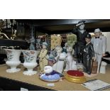 Nadal figure of Buster Keaton, four Lladro figures, Lladro mantel clock, Royal Doulton figure of