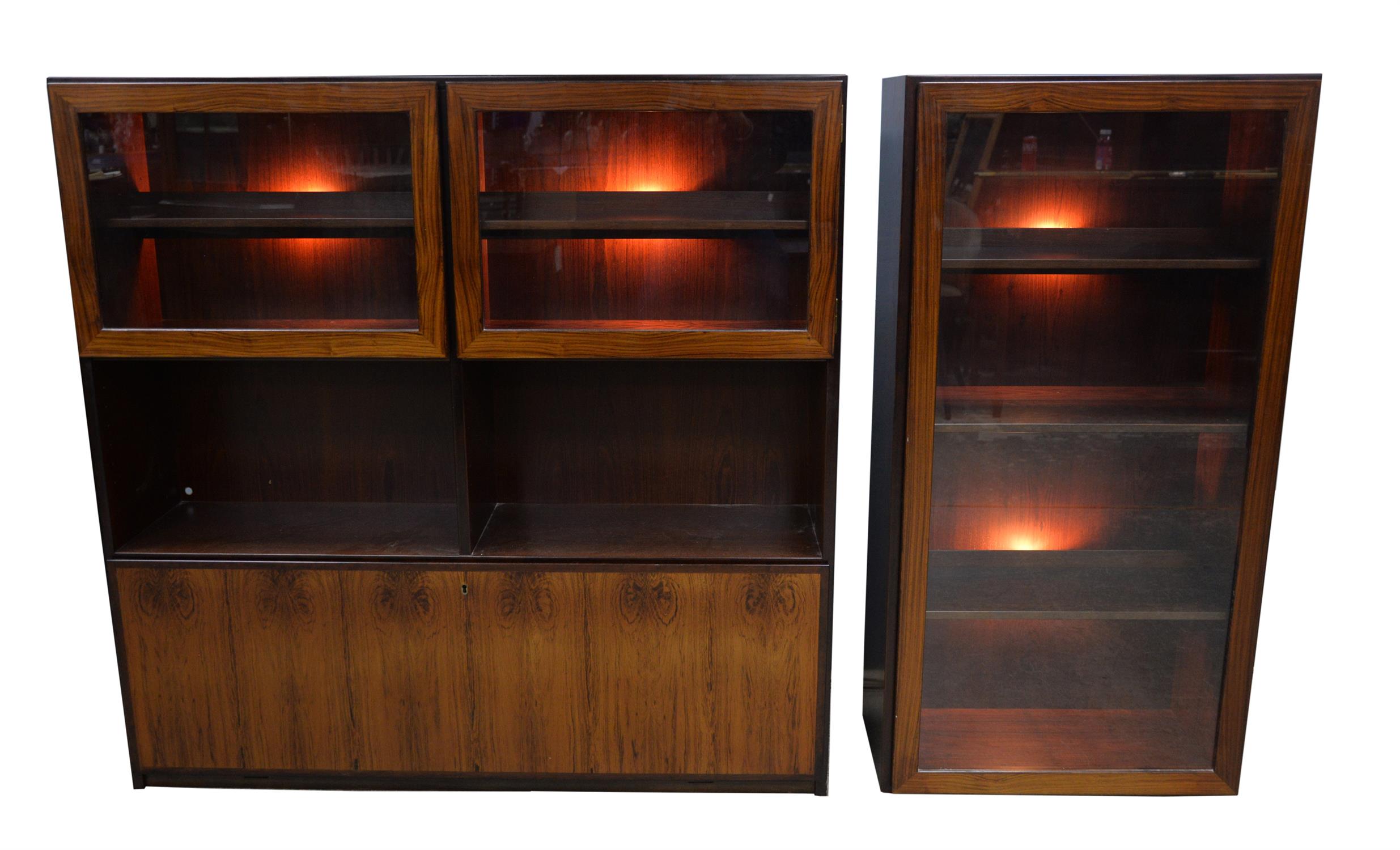 Jun, Denmark, a pair of cabinets, with solid doors on plinth bases, one with shelf,