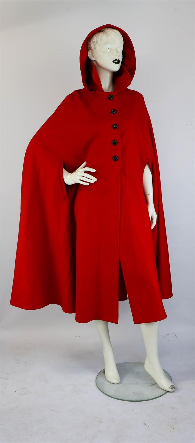 A 1970s original heavy cherry red wool long-length cape with hood, black buttons and arm slits. - Image 3 of 3