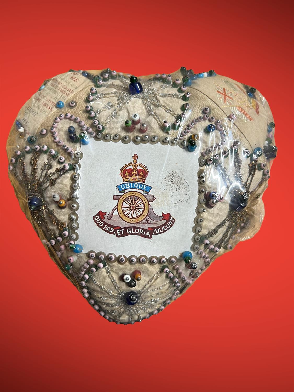 A pair of large World War One ornate hand-made sweetheart pin cushions. Army Service Corps and