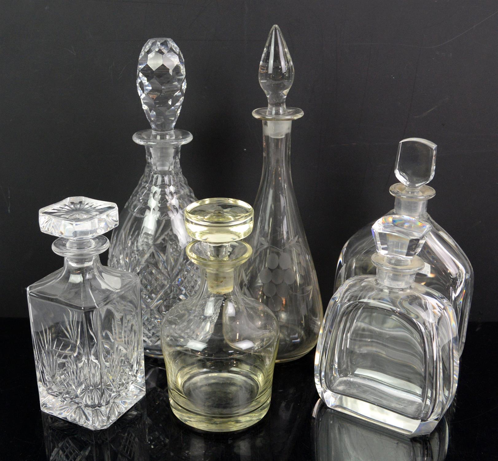 Glassware including cut glass decanters and glasses of various form including tumblers,