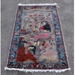 A pictoral rug, woven with a scene of a lady offering water to a man, a city beyond,