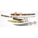 Indonesian sword and a jambiya with brass and white metal scabbard