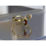 Single stone garnet ring, in a wishbone design, in 9ct gold, ring size L,1.3 grams