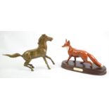 Beswick model of a fox, mounted on a wooden base, together with a brass model of a horse (2)