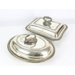 Two silver plated entree dishes and covers, one of rectangular form with gadrooned decoration,