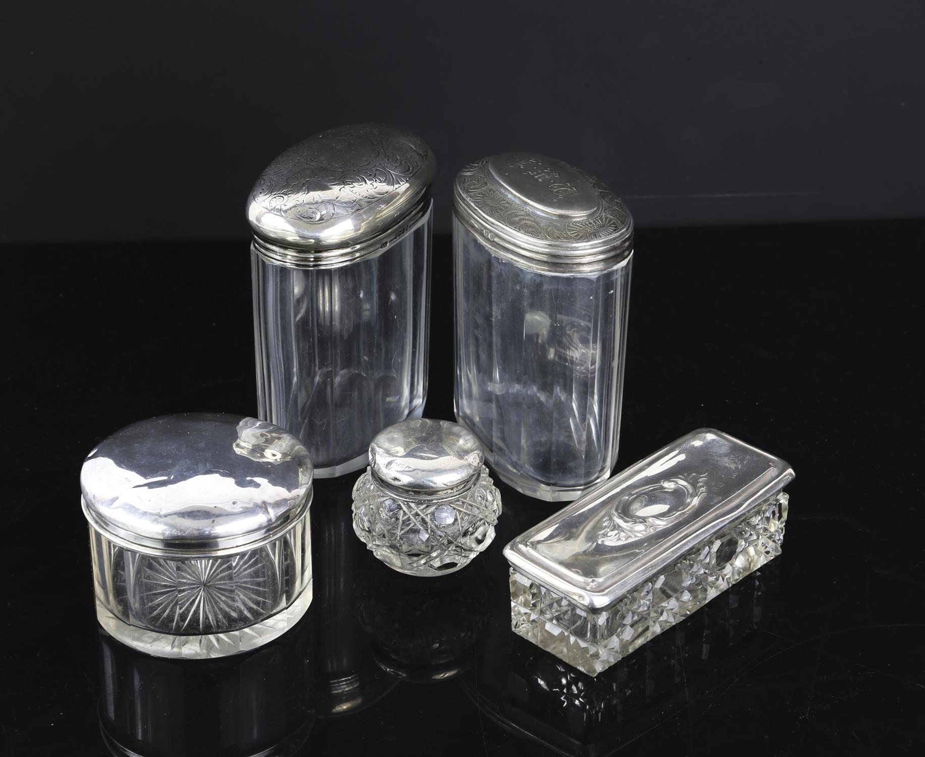 Selection of 5 silver topped dressing table jars and pots of varying sizes, shapes and ages