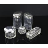Selection of 5 silver topped dressing table jars and pots of varying sizes, shapes and ages