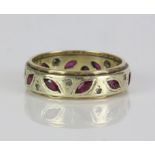 Full eternity ring in 9ct set with marquise rubies and round paste, ring size P, 5.1 grams