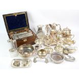 Mother of pearl inlay travel box containing several silver plated topped bottles and jars and a