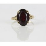 Single stone garnet ring, in stamped 9ct, ring size Q, 2.2 grams